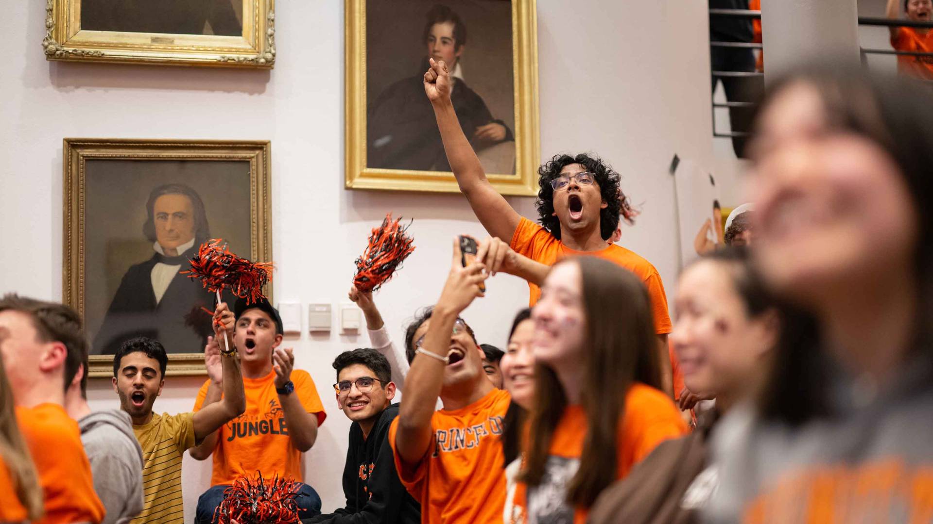 Princeton students cheering the basketball team