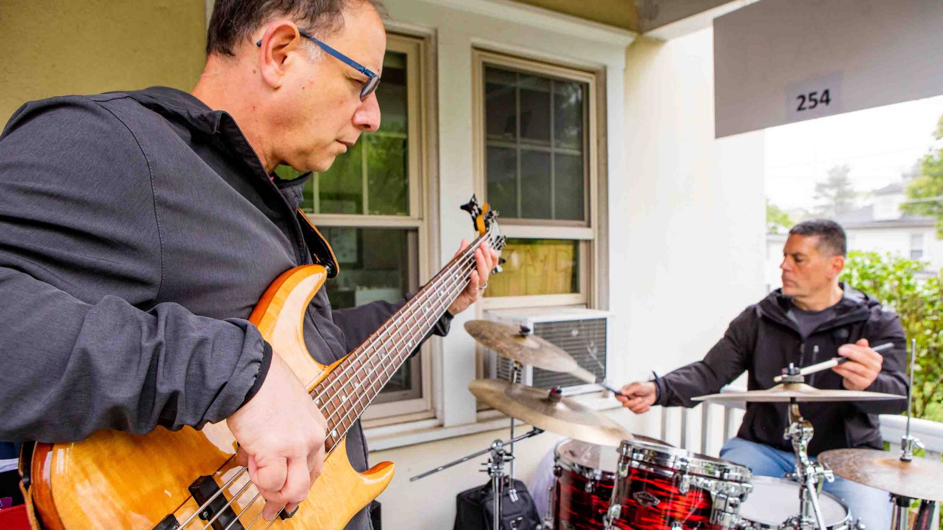 Bass player and drummer during the Princeton Porchfest 2023.