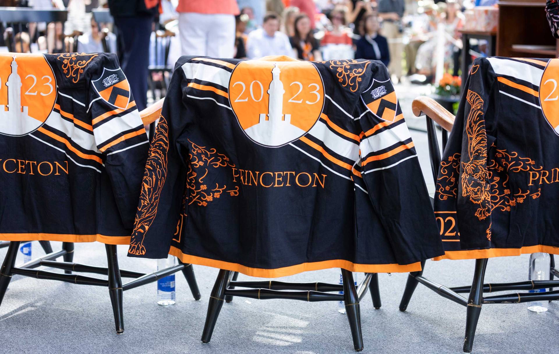 Class Day jackets draped on chairs