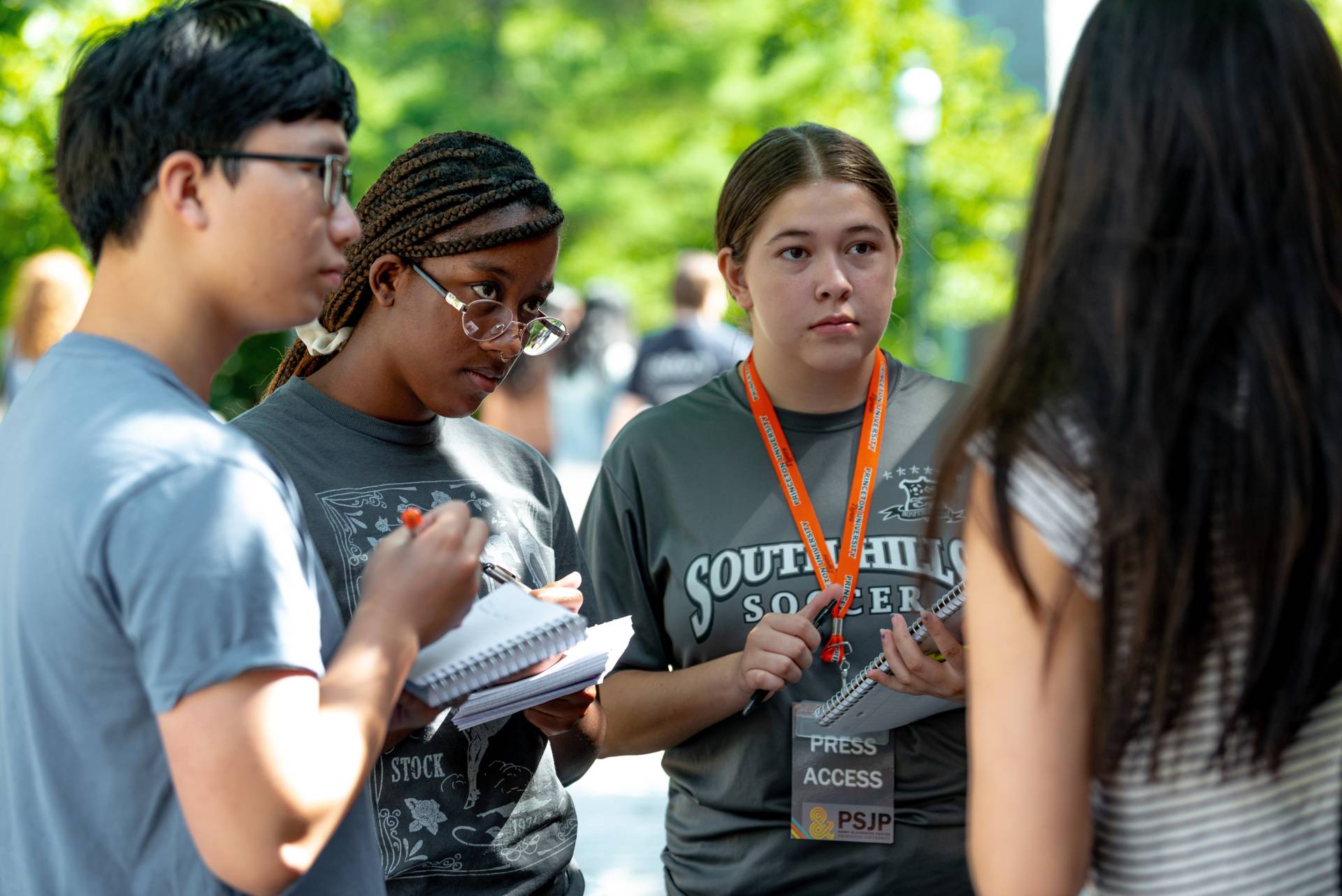 Students in the Princeton Student Journalism Program (PSJP) interviewing people.