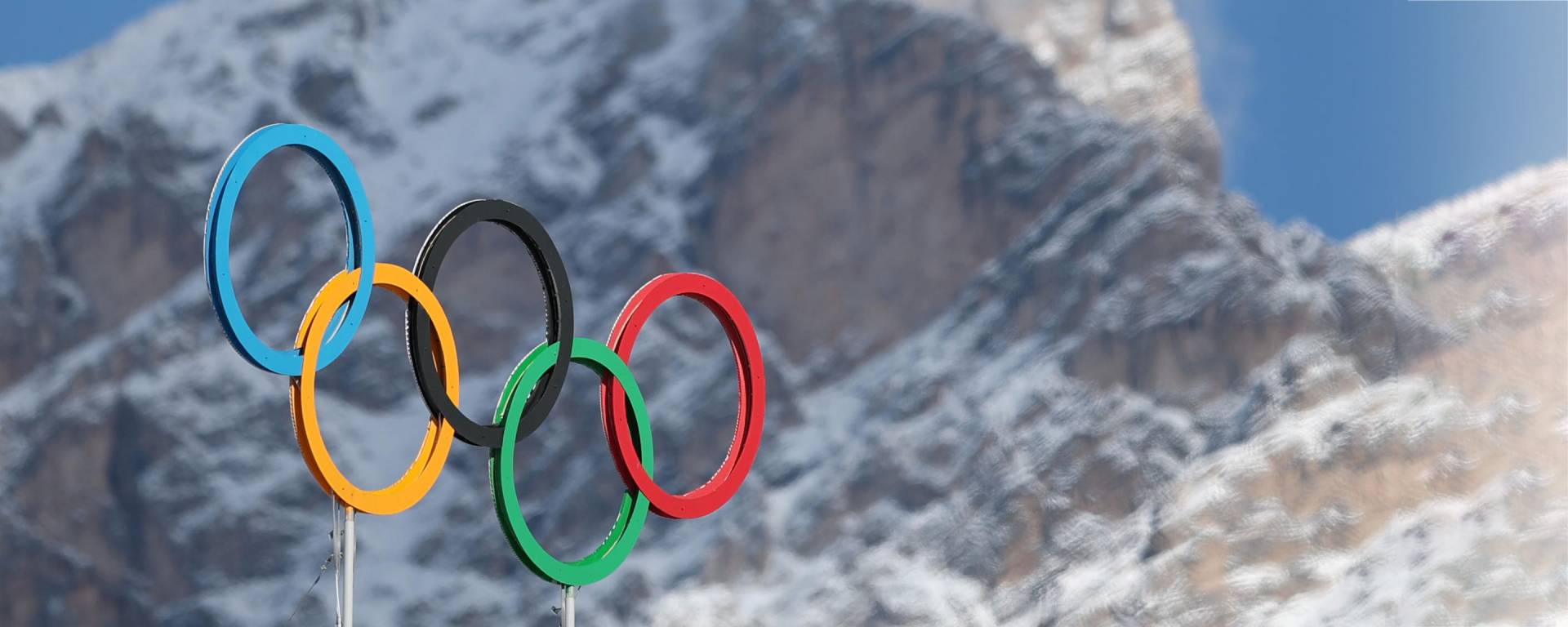 Olympic Rings against snowy mountains
