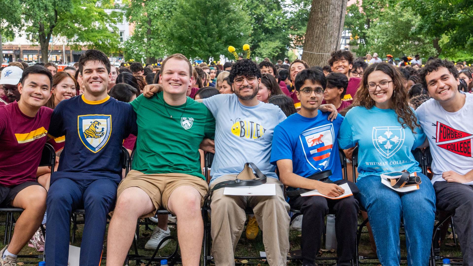 Students wearing residential college t-shirts