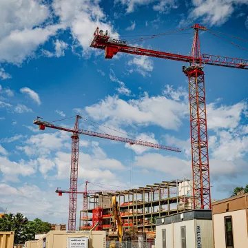 Cranes at construction site of SEAS building.