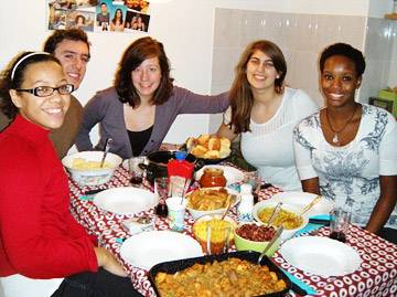 Students with host family in Serbia