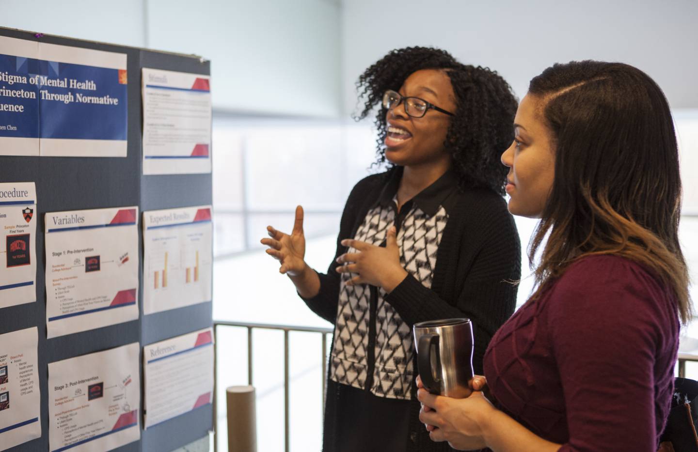 A student presents her findings at the 2017 CBLI Poster Fair