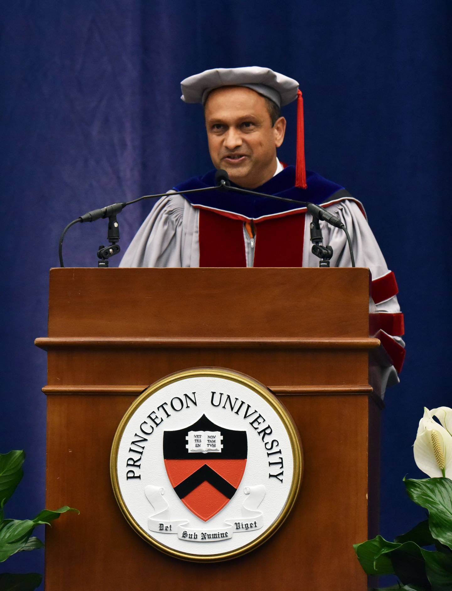 Sanjeev Kulkarni speaks at podium