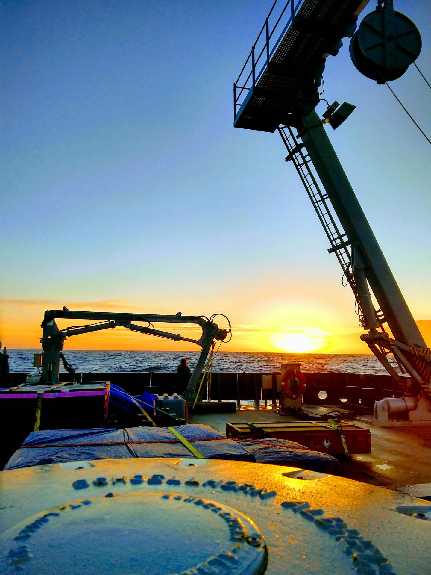 Sunset on the ocean from a research boat