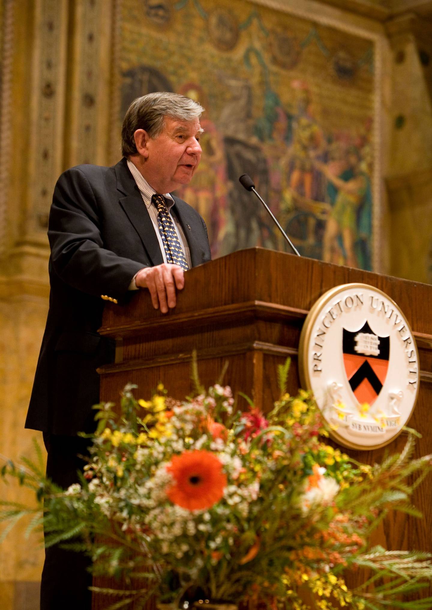 William G. Bowen speaks at a podium