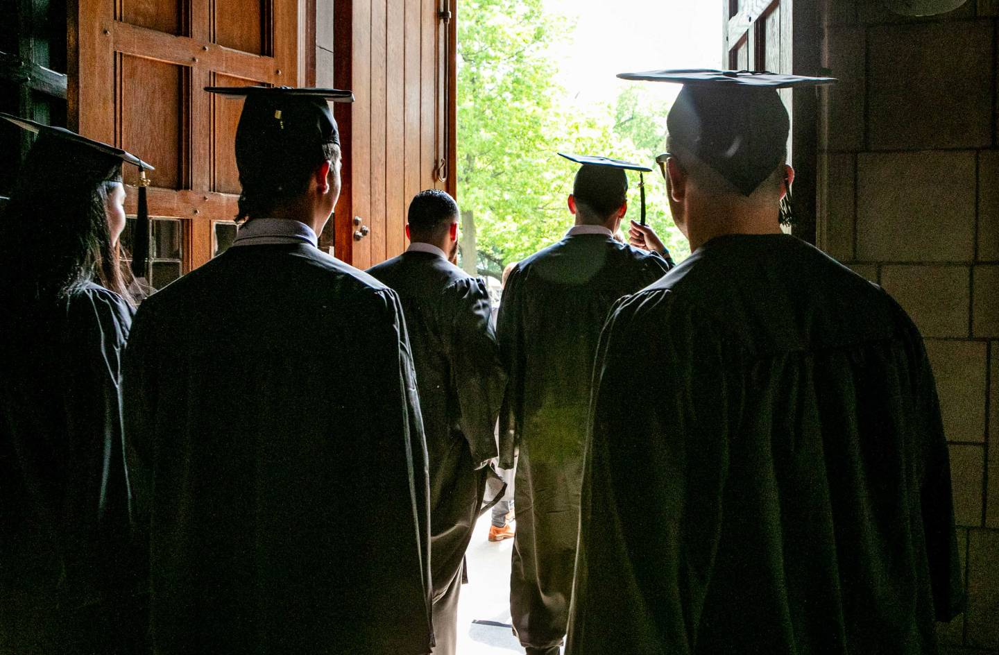 Seniors head out the doors of the chapel