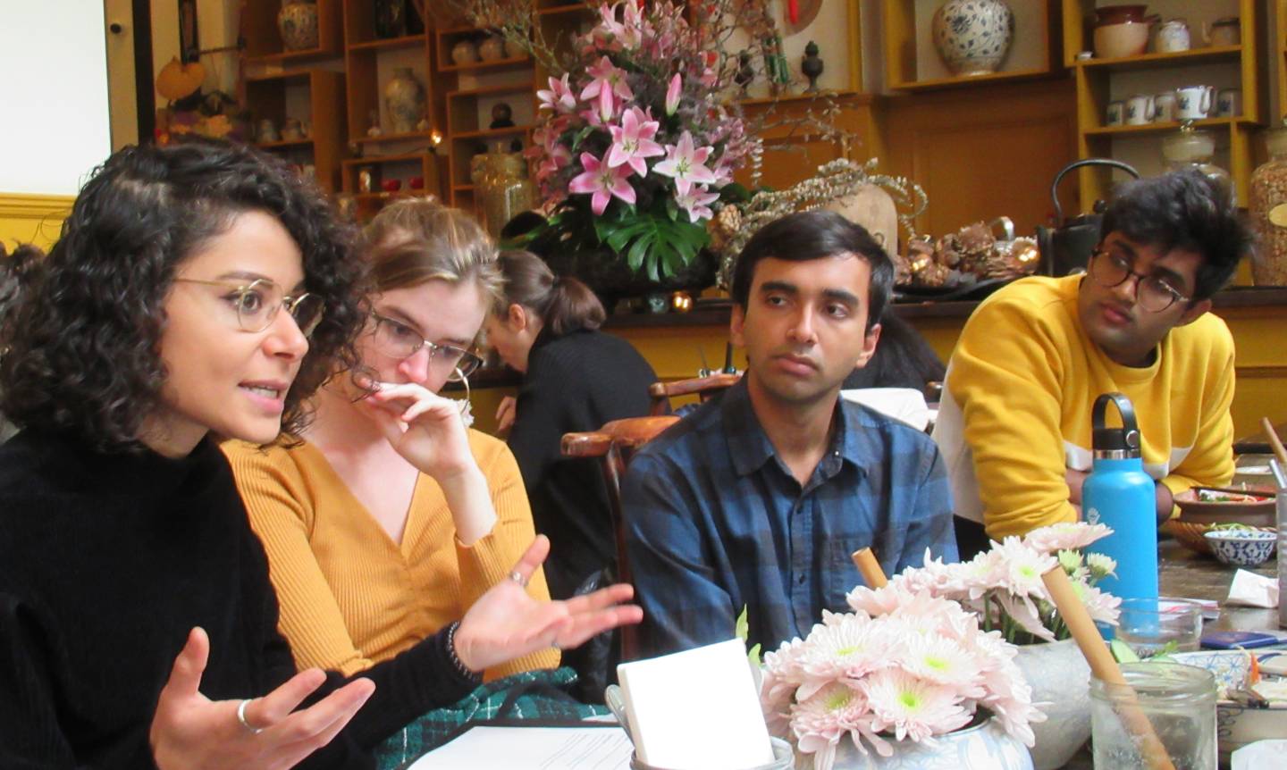 Berlin journalist with three Princeton students