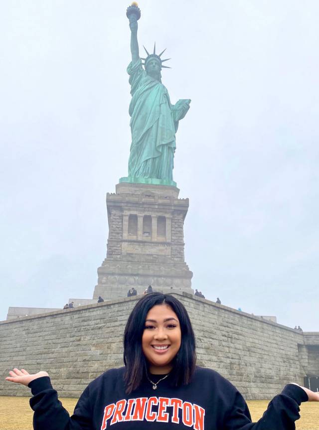 Clariza Macaspac in front of the Statue of Liberty