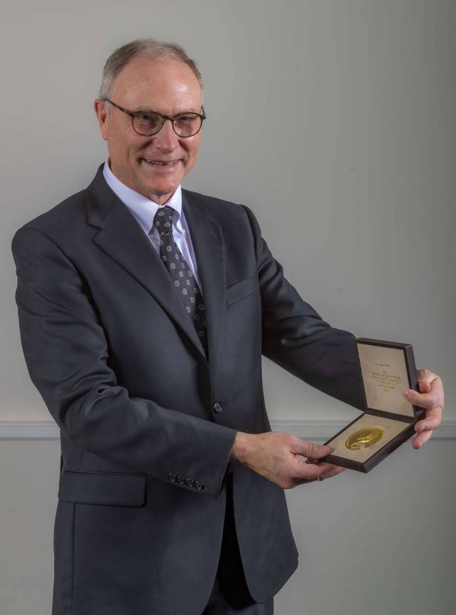 David Card and his Nobel medal