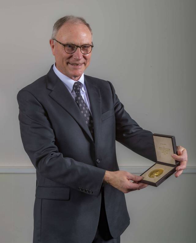 David Card with his medal