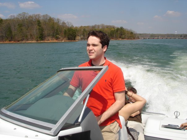 chrisdrivingtheboat.jpg